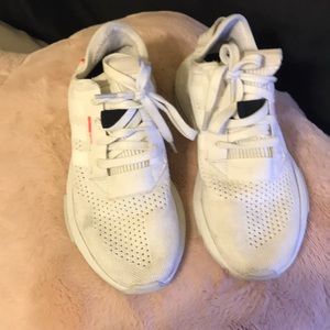 White  running Adidas sneakers
